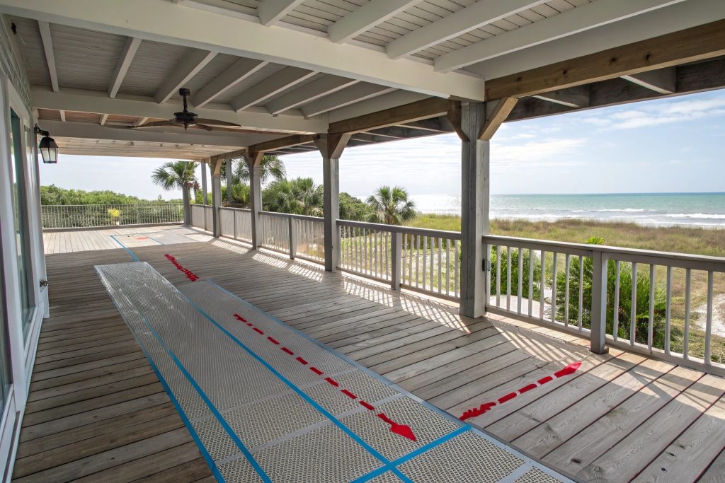 Cross-section diagram of proper deck ventilation design that prevents moisture buildup and fungal growth in Palm Beach's humid conditions