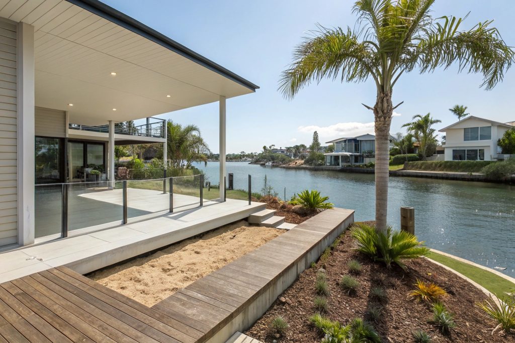 Modern deck with concrete foundation footings in Main Beach showing canal proximity and sandy soil conditions